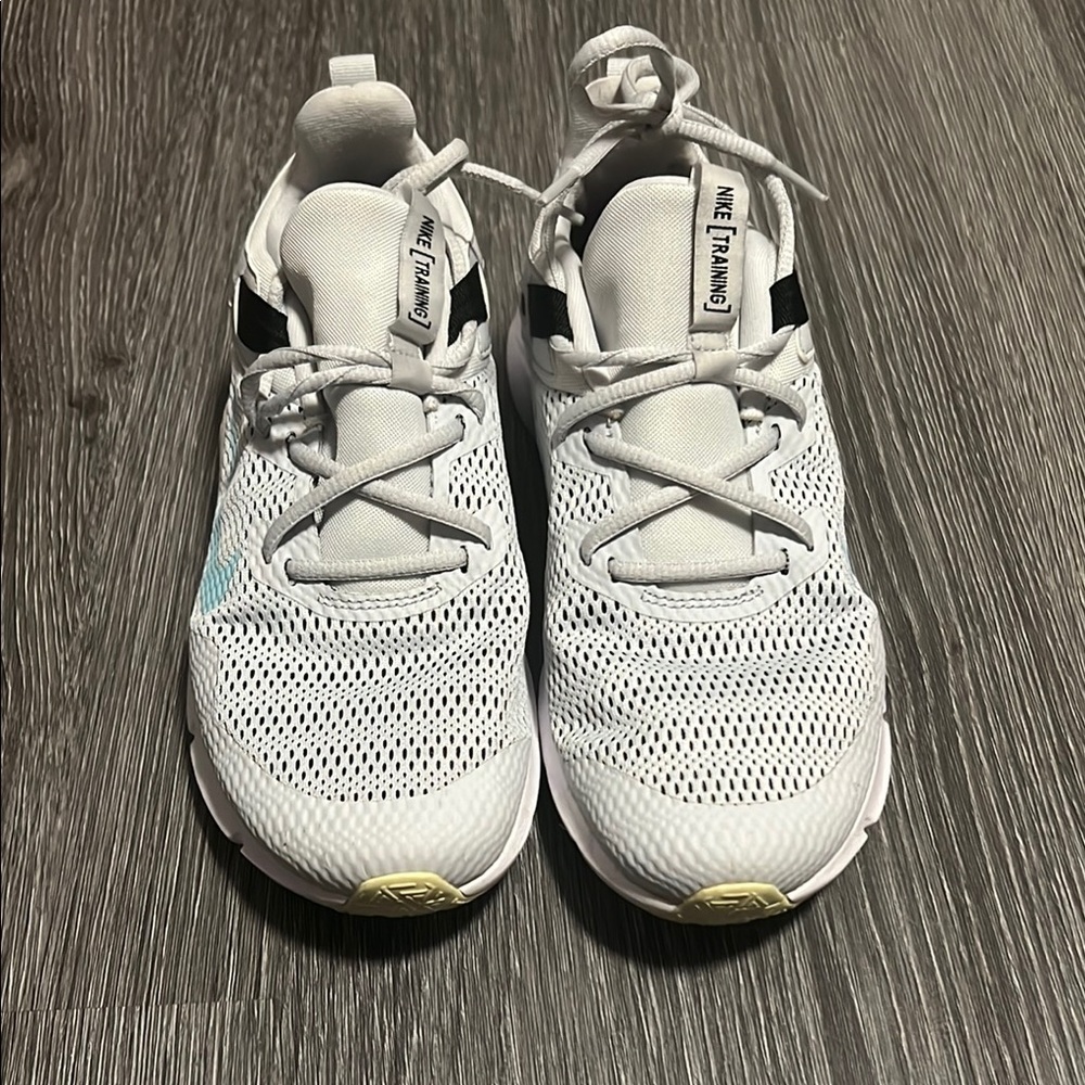 Nike White and Blue Sneakers with Breathable Mesh and Unique Lacing System